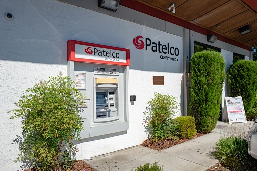 Lafayette, California, United States - July 16, 2019:  Close-up of sign for Patelco Credit Union and Automated Teller Machine in Lafayette, California, July 16, 2019