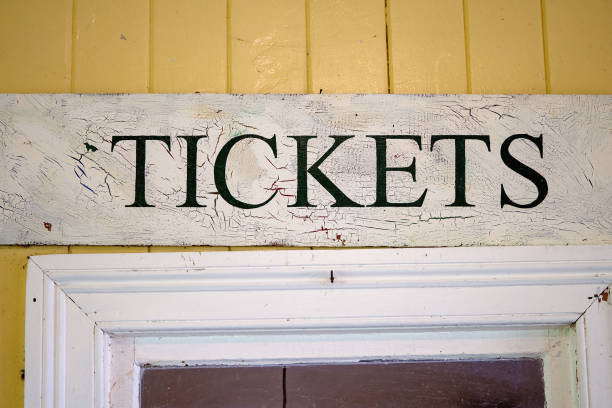 Inside old train station, ticket booths can be seen