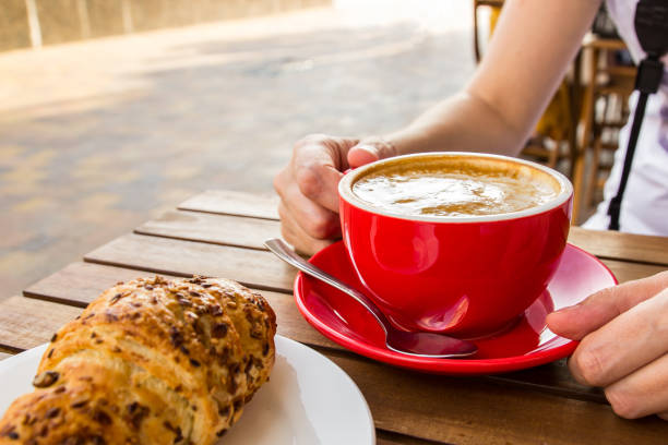 istock The cup of cappuccino with croissant 1163626626