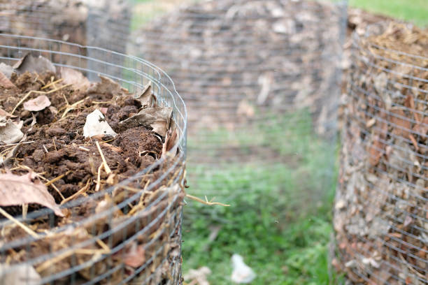 istock organic compost heap. fertilizer production for soil cultivation 1163631110