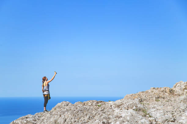 istock Woman in mountains. 1163631202