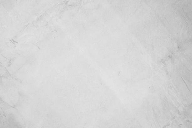 istock White concreted wall for interiors or outdoor exposed surface polished concrete. Cement have sand and stone of tone vintage, natural patterns old antique, design floor texture background. 1163631773