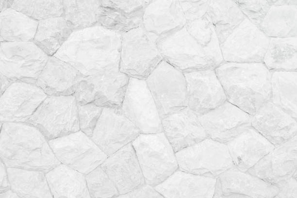 istock Brick stone wall stack of medieval natural stone texture background or rock strata boundary the rock seamless abstract and fragment of a walls from a gray. 1163635370