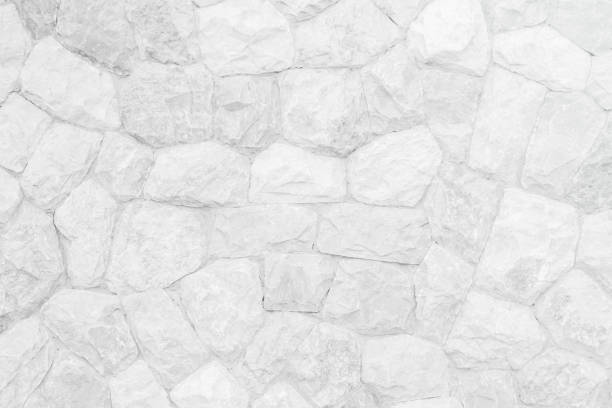 la pila de pared de piedra de ladrillo de fondo de textura de piedra natural medieval o estratos de roca limita el abstracto y fragmento de roca sin costuras. - brick construction material house strength fotografías e imágenes de stock
