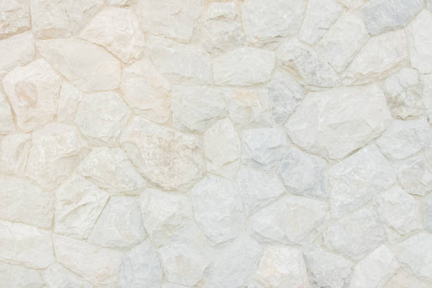 istock Brick stone wall stack of medieval natural stone texture background or rock strata boundary the rock seamless abstract and fragment of a walls from a gray. 1163635372