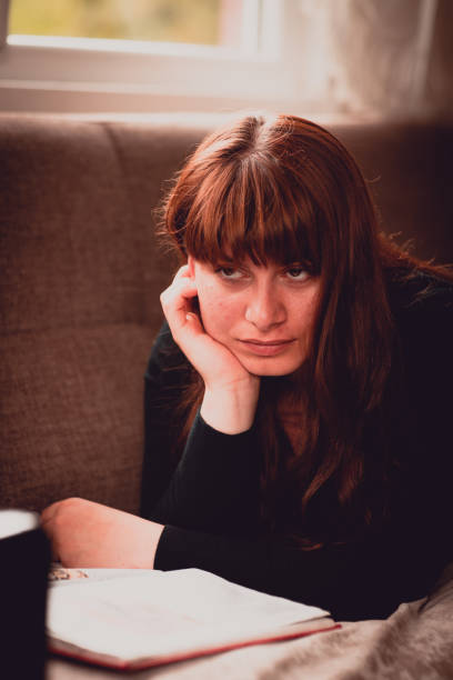 istock Portrait of woman thinking something 1163638678