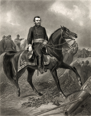 Vintage full-length portrait features General Ulysses S. Grant wearing a military uniform, sitting on a horse, among soldiers during an American Civil War battle.