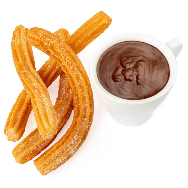 istock Churros with chocolate cup. Churro - Fried dough pastry with sugar powder isolated on white  background 1163646350