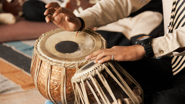 istock A Student performing Indian traditional musical instrument 