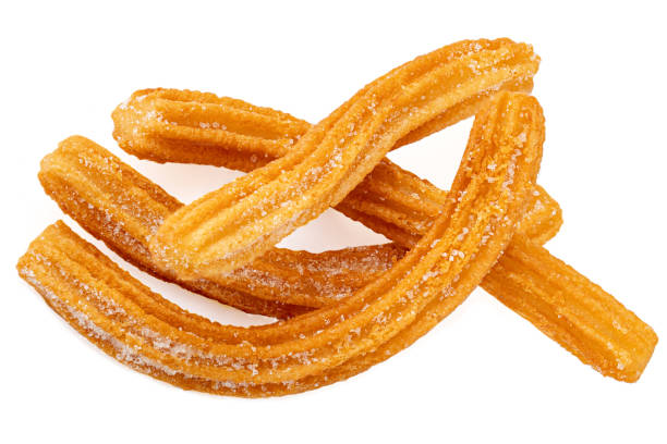 istock Churros isolated on white background. Traditional Mexican  cusine. Churro close up 1163646364