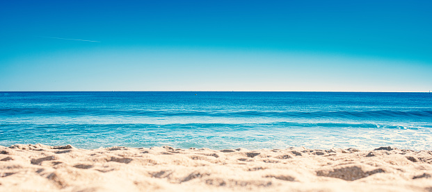 Beautiful seascape on blue sky at summer time