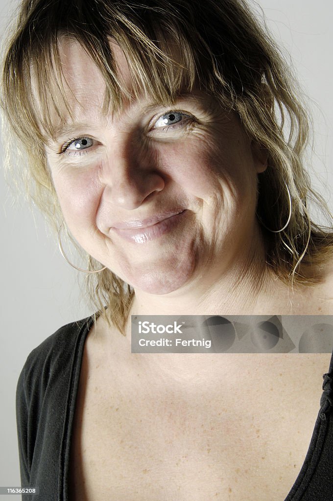 Smiling woman Smiling 39-year old woman with good eye contact 35-39 Years Stock Photo