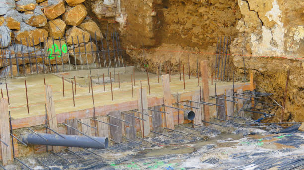 istock New building site awaiting steel framework for drainage and other serices 1163653096