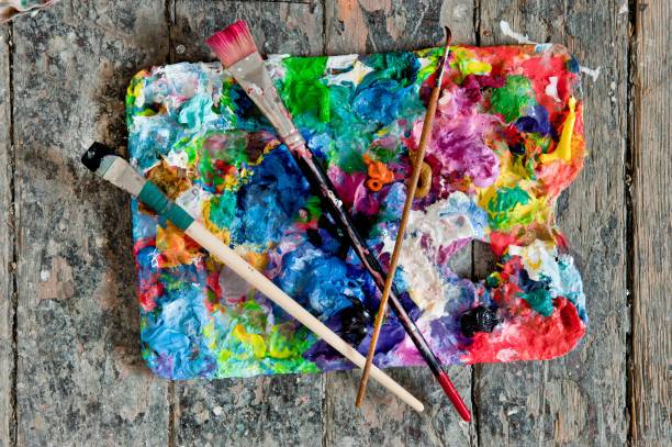 istock Artist paint brushes and palette 1163655095