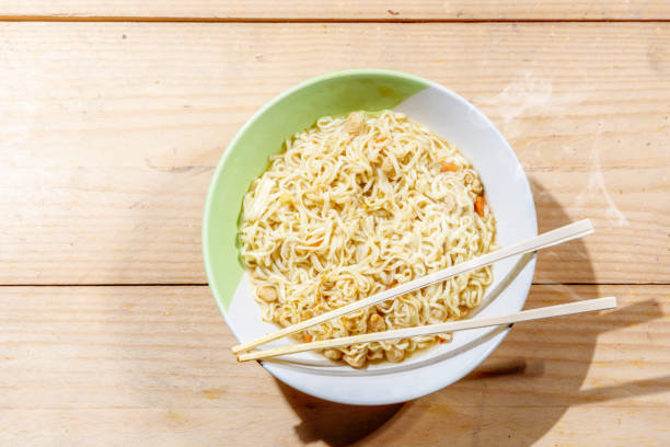 istock Noodles on the bowl with chopstick 1163655840