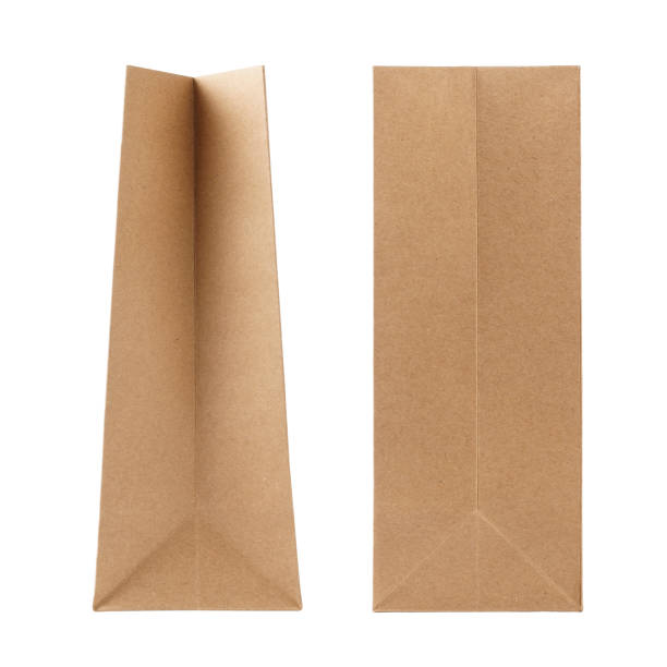 istock Kraft paper bags isolated on white background. 1163660923