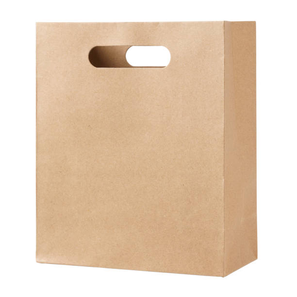 istock Kraft paper bag isolated on white background. 1163660967