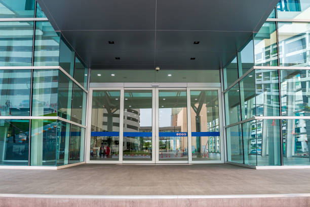 Modern architecture, blue-green glass, steel structure Showing modernity, strength and professionalism
