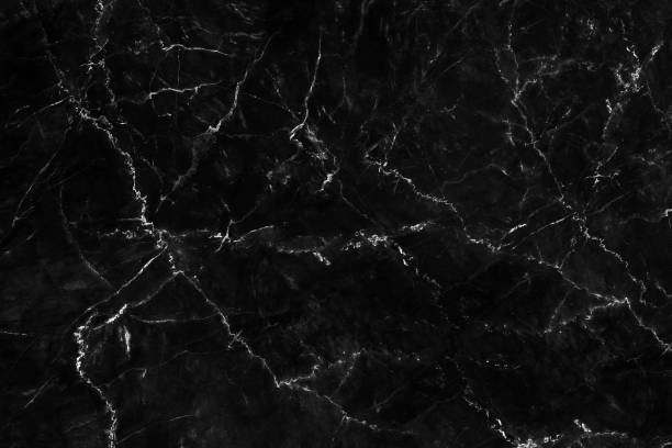Natural black marble texture for skin tile wallpaper luxurious background, for design art work. Stone ceramic art wall interiors backdrop design. Marble with high resolution stock photo