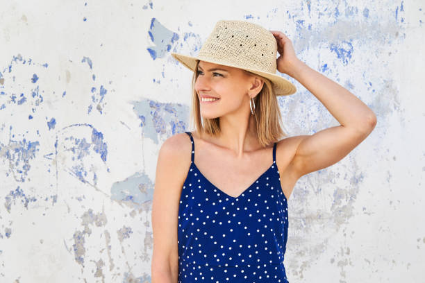 istock Smiling girl in hat 1163671319