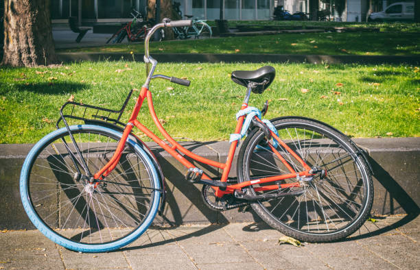 istock Bike leaned on a wayside in Rotterdam city, Netherlands 1163671379