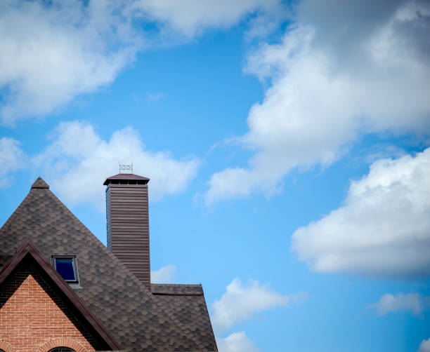 istock Part tiled roofs against the sky 1163673073