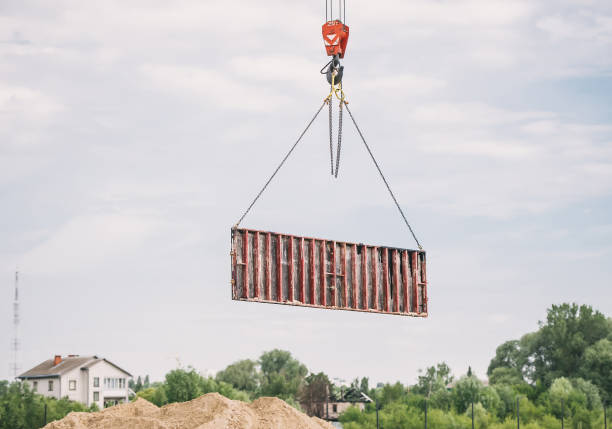 istock Construction crane is near the pile of sand 1163676587