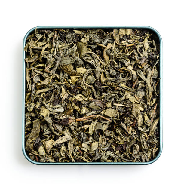 istock Dried tea leaves on white background - top view 1163679841