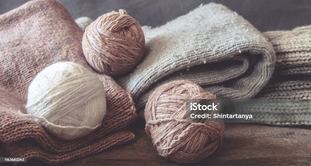 Knitted From A Gray Yarn Sweater And Thread For Knitting Closeup Knitting  As A Hobby Accessories For Knitting Stock Photo - Download Image Now -  iStock