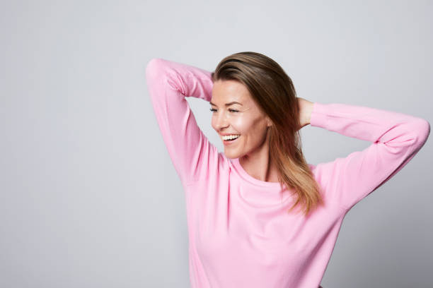 Smiling woman in pink