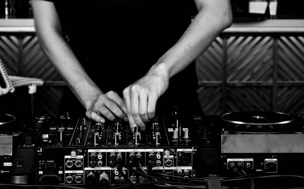istock EDM DJ plays and controls the disc at the turntable 1163684979