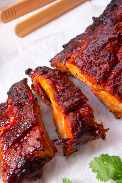 istock BBQ spare ribs from a charcoal grill 1163689351