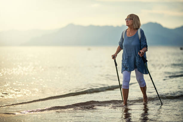 Senior woman Nordic walking on the beach Senior woman enjoying sea vacations. The woman is Nordic walking on the beach.
Nikon D850 nordic walking pole stock pictures, royalty-free photos & images
