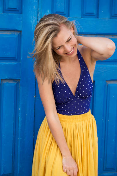 istock Blue and yellow girl 1163694081