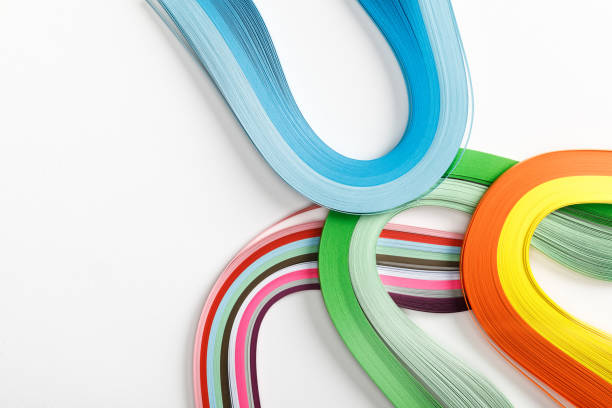 istock top view of wavy rainbow paper lines on grey background with copy space 1163694181