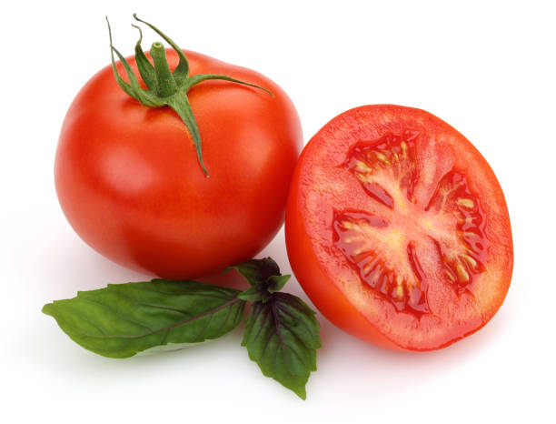 istock Fresh tomatoes and basil leaves isolated 1163696124