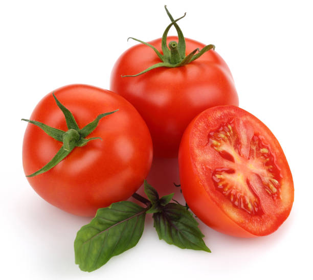 istock Fresh tomatoes and basil leaves isolated 1163696235