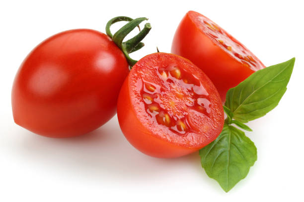 istock Cherry tomatoes and mint leaves isolated 1163697230