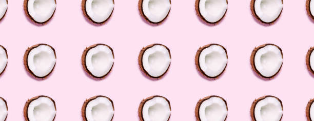 istock Coconut on pink background. Minimal concept. 1163697711