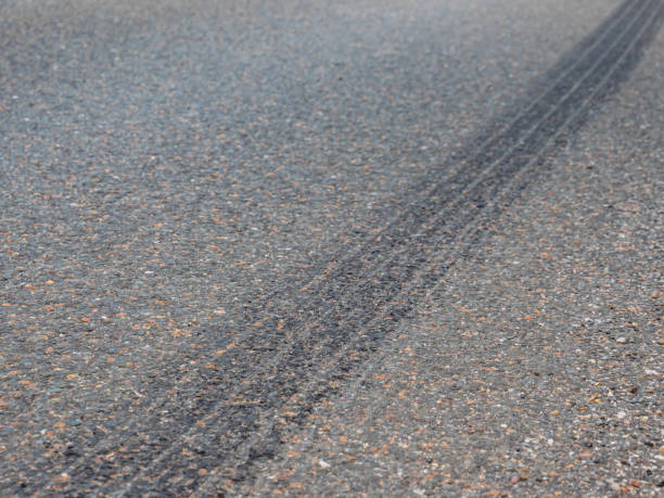 istock Emergency braking skid mark traffic accident 1163697950