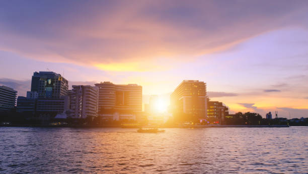 istock Sunset view of Downtown at Chao Phraya River, bangkok thailand. 1163698049