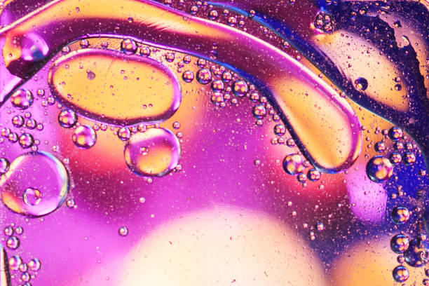 istock oil drops on a water surface abstract background. Art bubble 1163700393