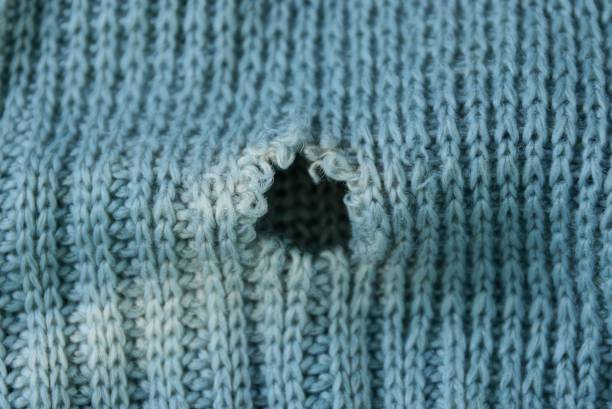 istock gray background of woolen fabric 1163701453