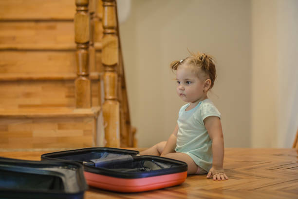 istock Baby girl in suitcase 1163702918