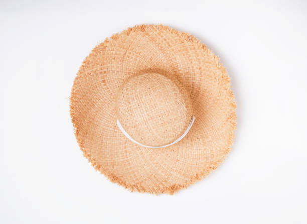 istock Feminine straw hat with big fields isolated on thite background 1163703020