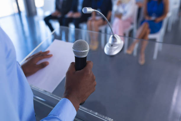 istock Male speaker speaks in business seminar 1163703191