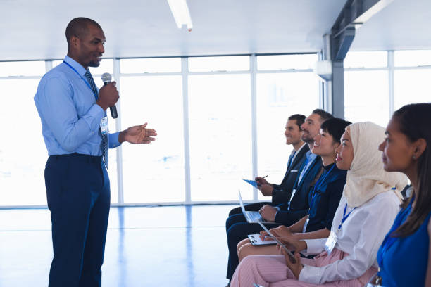 istock Male speaker speaks in business seminar 1163703267