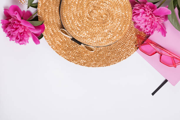 istock Creative summer composition with straw hat and beautiful pink peonies 1163703414