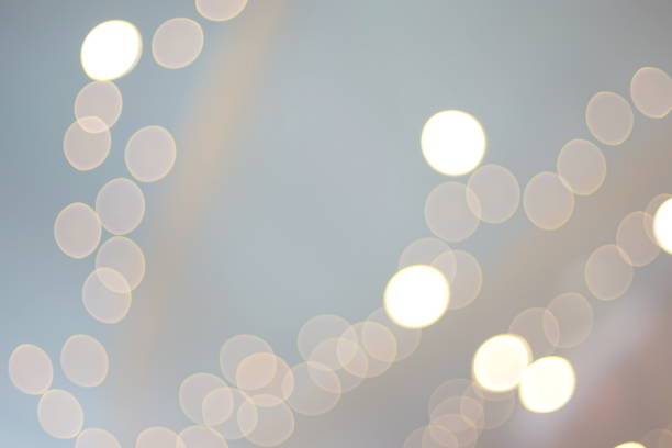 istock Defocused yellow gold Christmas lights bokeh 1163704351