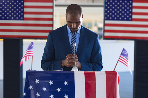 US State Department flag rostrum with microphone. Digitally generated image